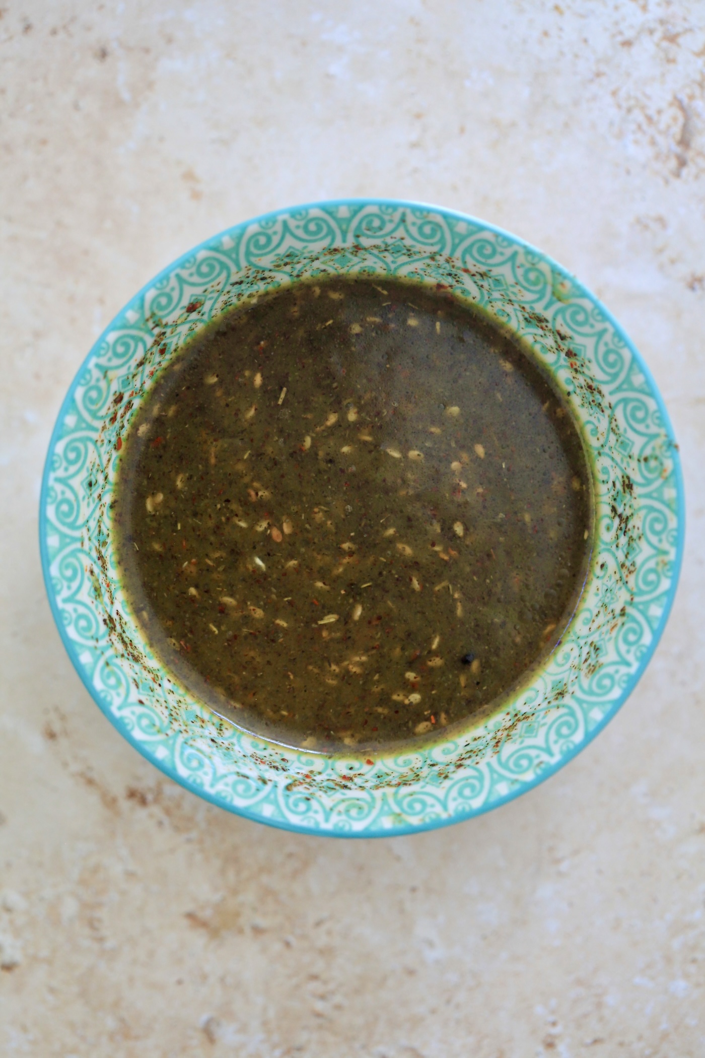 bowl with brown salad dressing