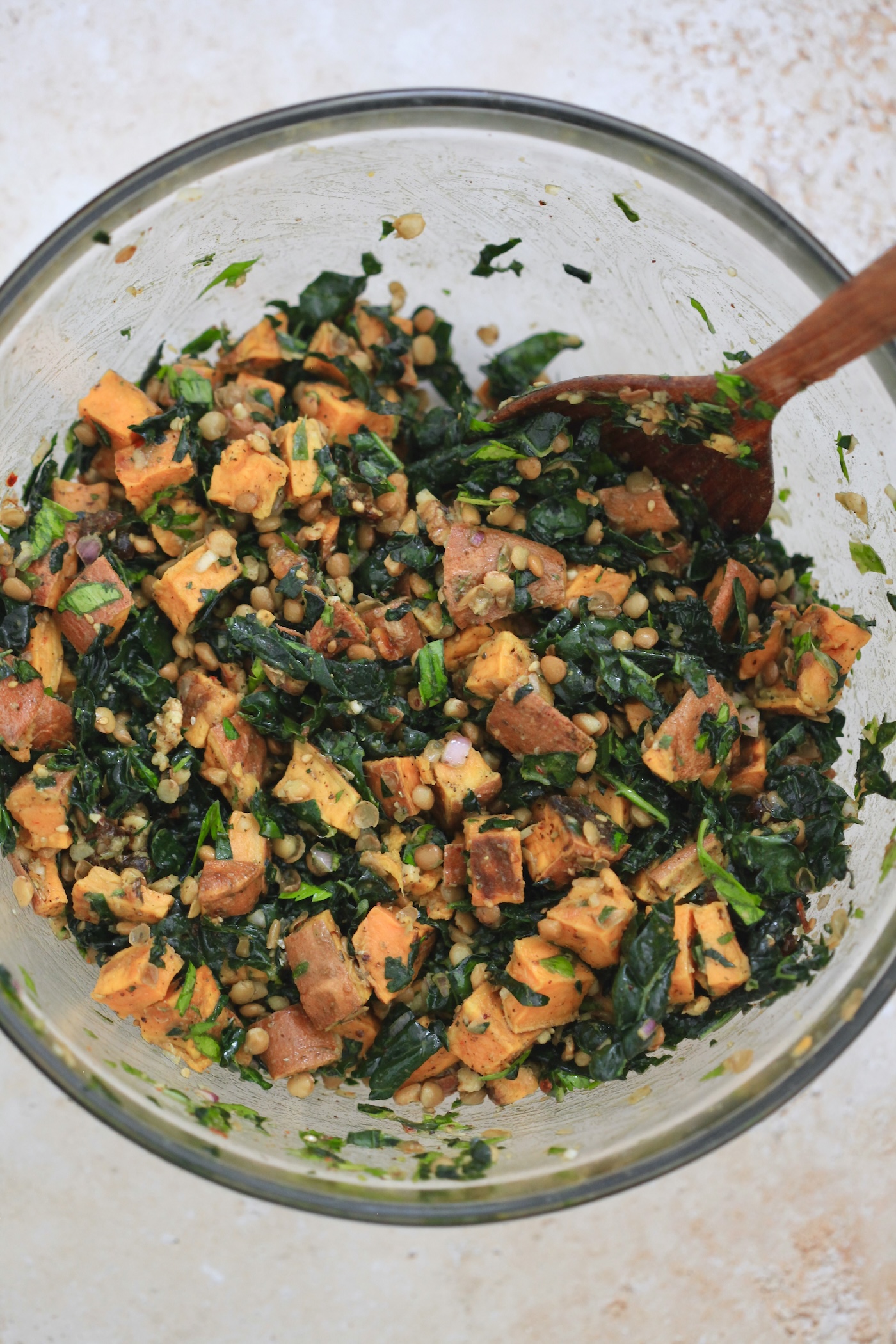bowl with sweet potatoes and kale mixed together