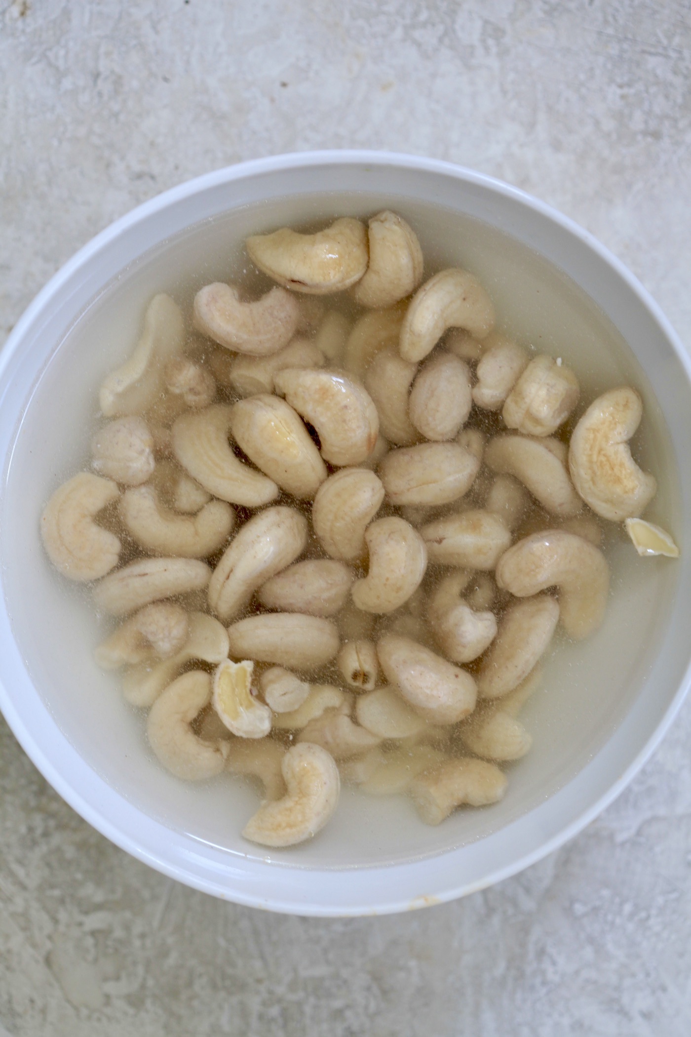 bowl with cashews in water