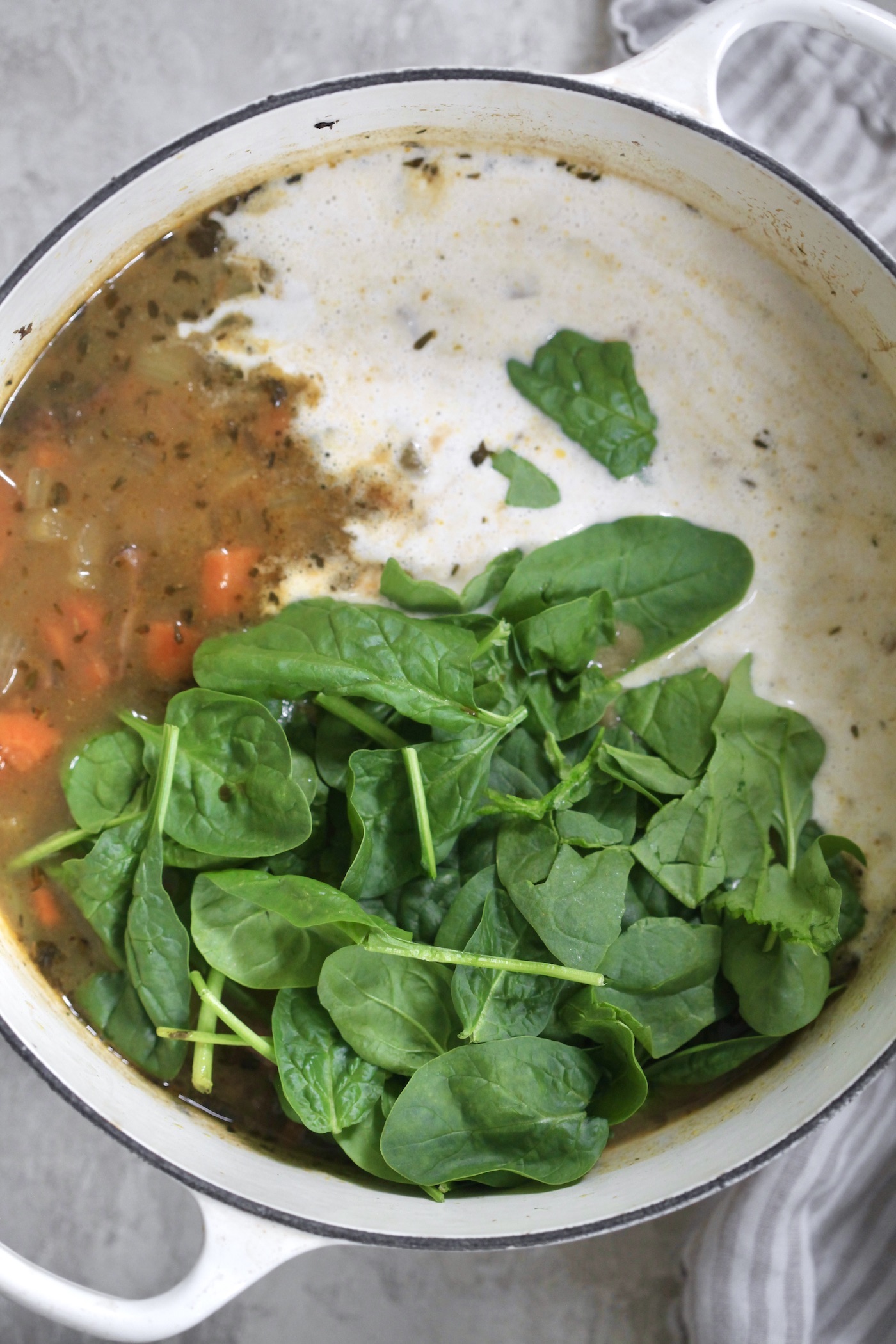soup with cashew cream and spinach