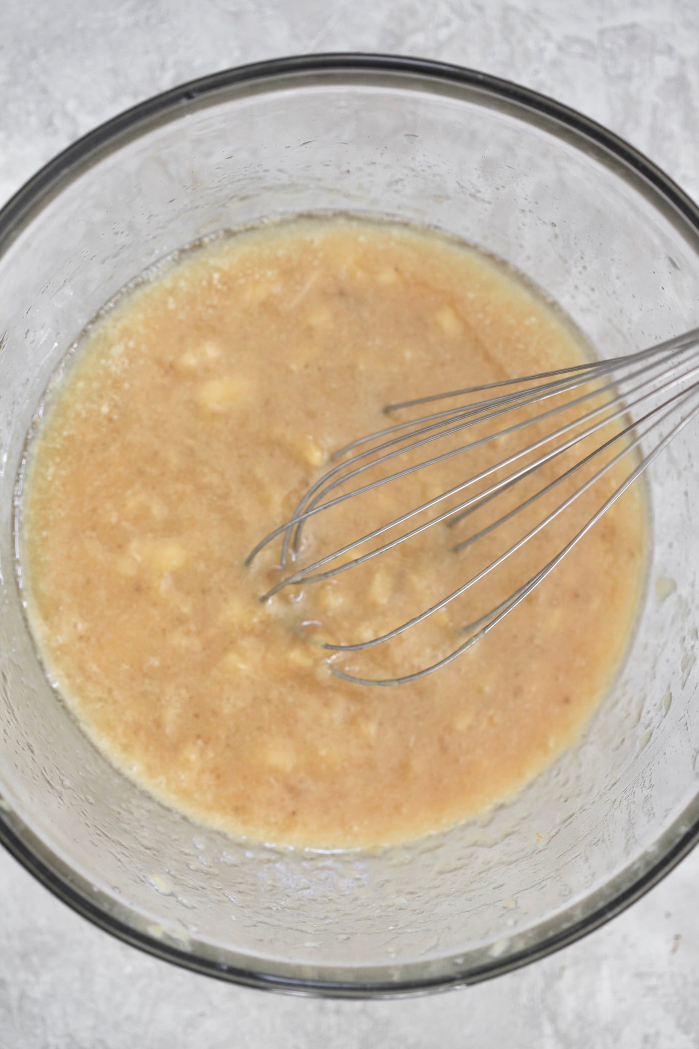whisking bowl with banana mixture