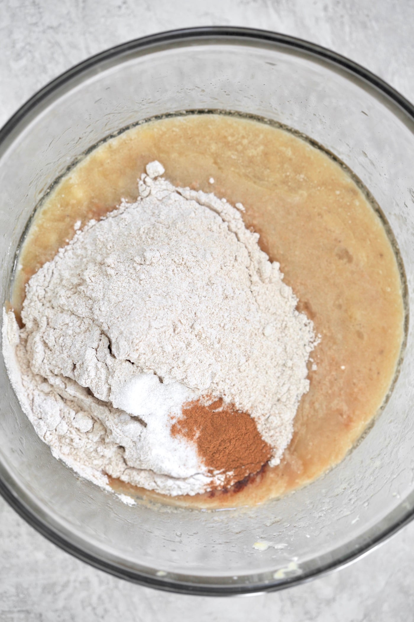 flour and cinnamon added to wet ingredients