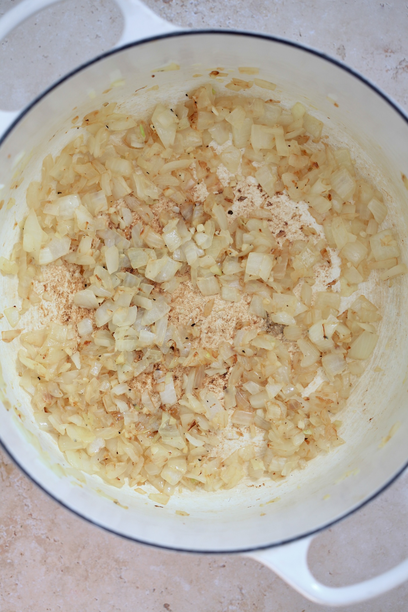 onion cooking in pan.