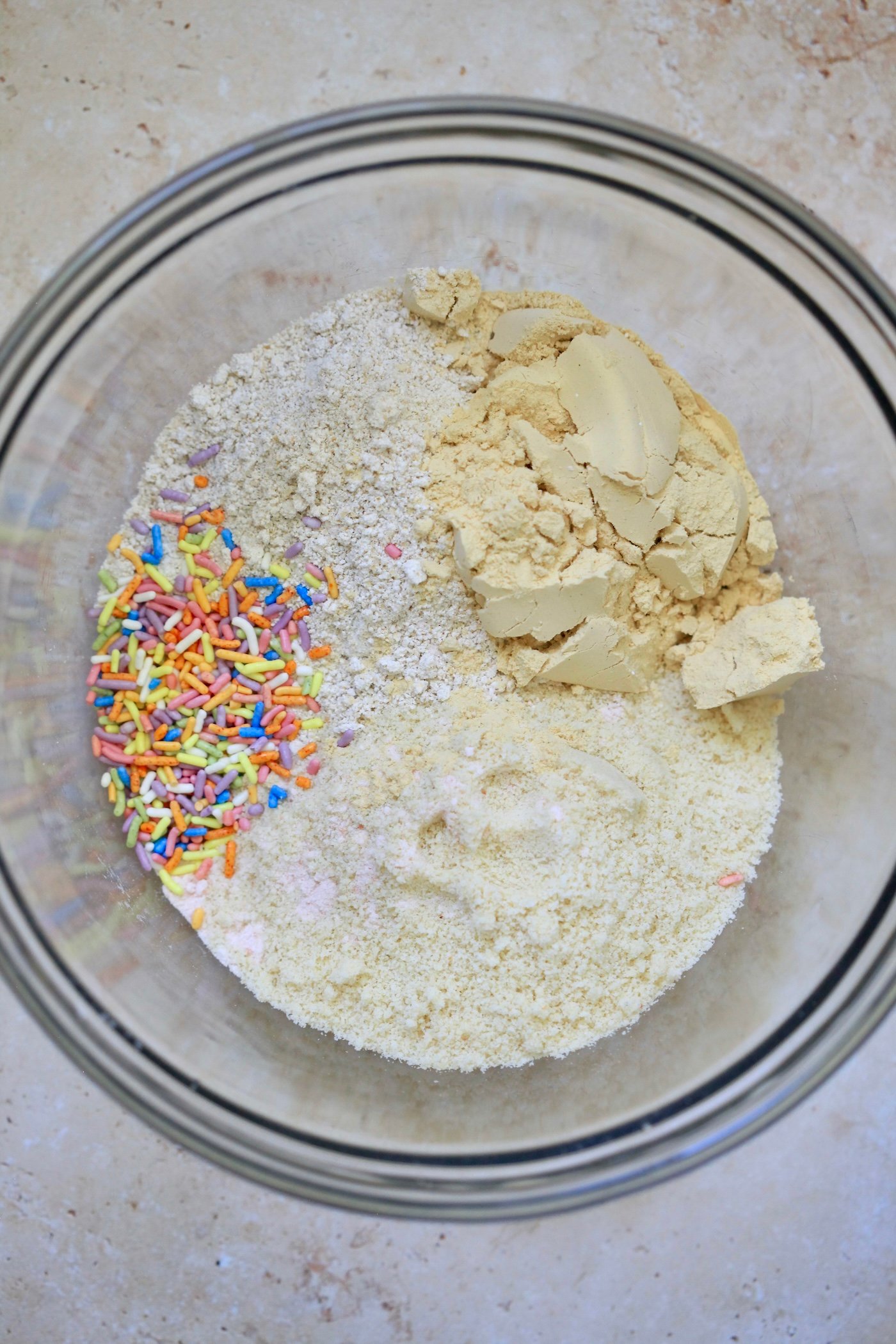 flour, protein and sprinkles in bowl