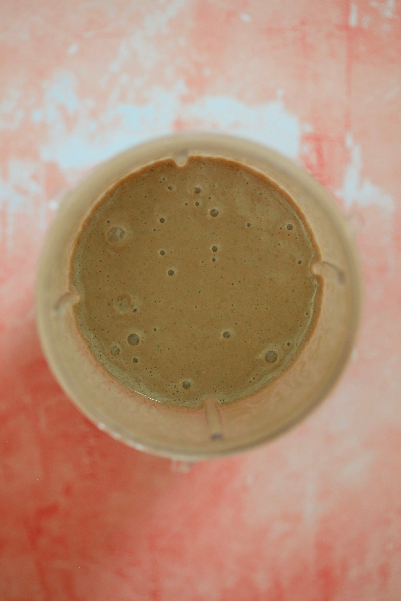 blended brown smoothie in jar.