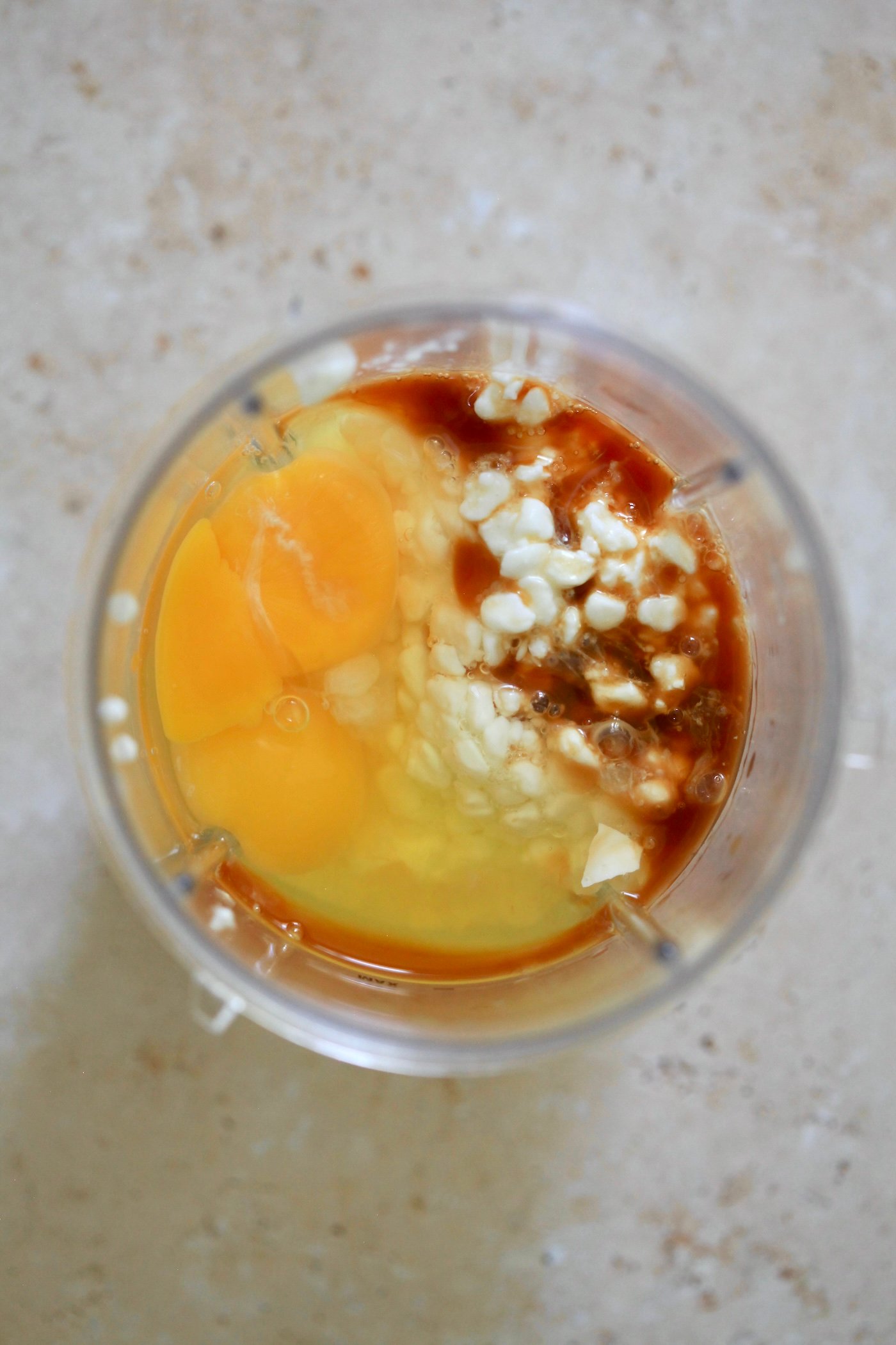 eggs and cottage cheese in blender jar.