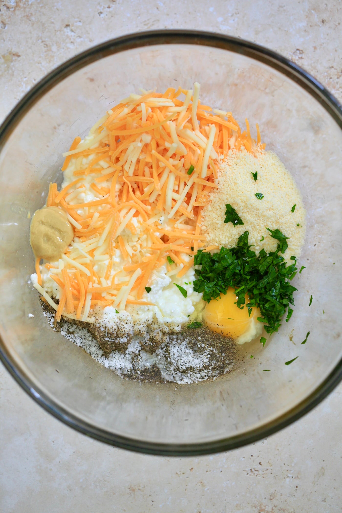 cheese, breadcrumbs, egg in mixing bowl