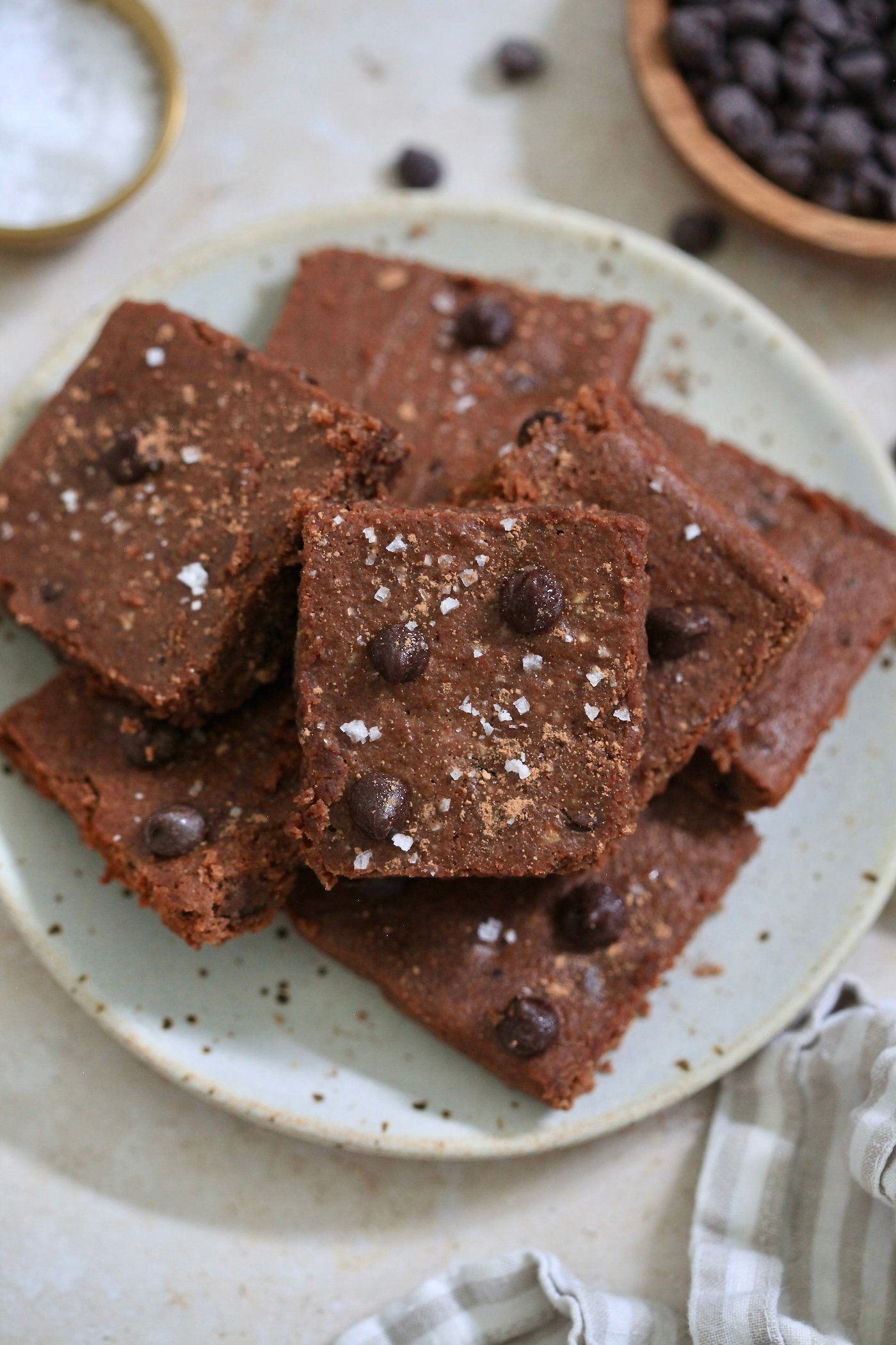plate of brownies with chocolate chips and salt.