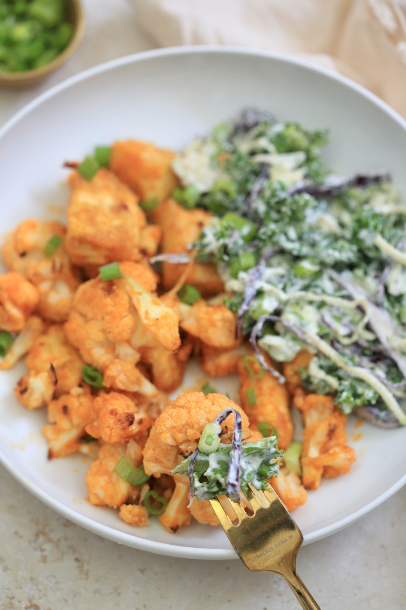 up close picture of buffalo tofu with slaw