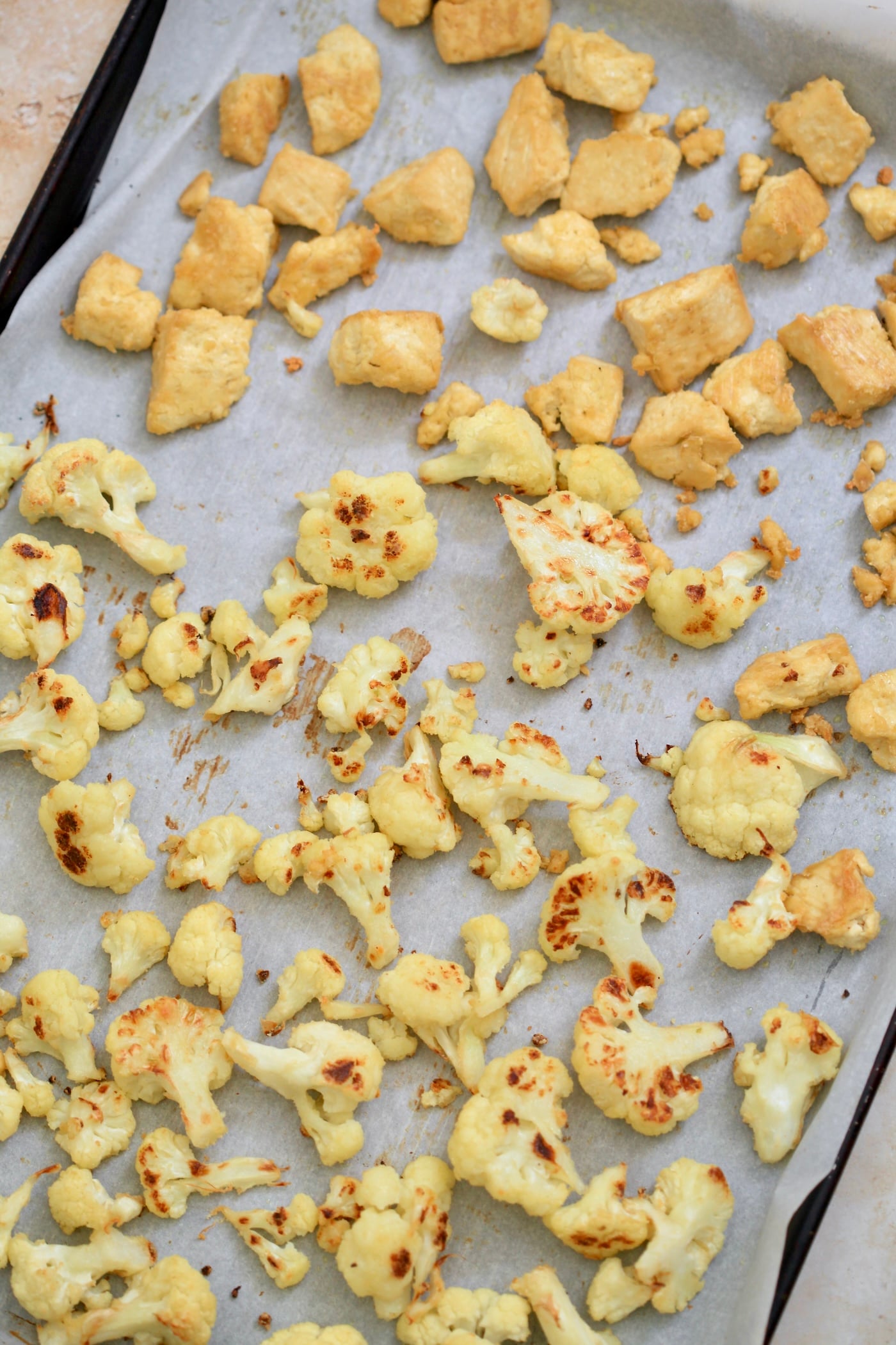 roasted tofu and cauliflower on sheet pan