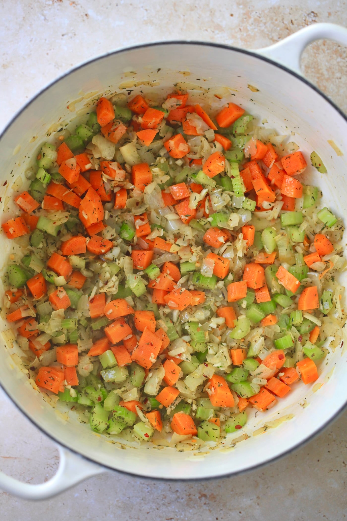 mirepoix with spices in pot.