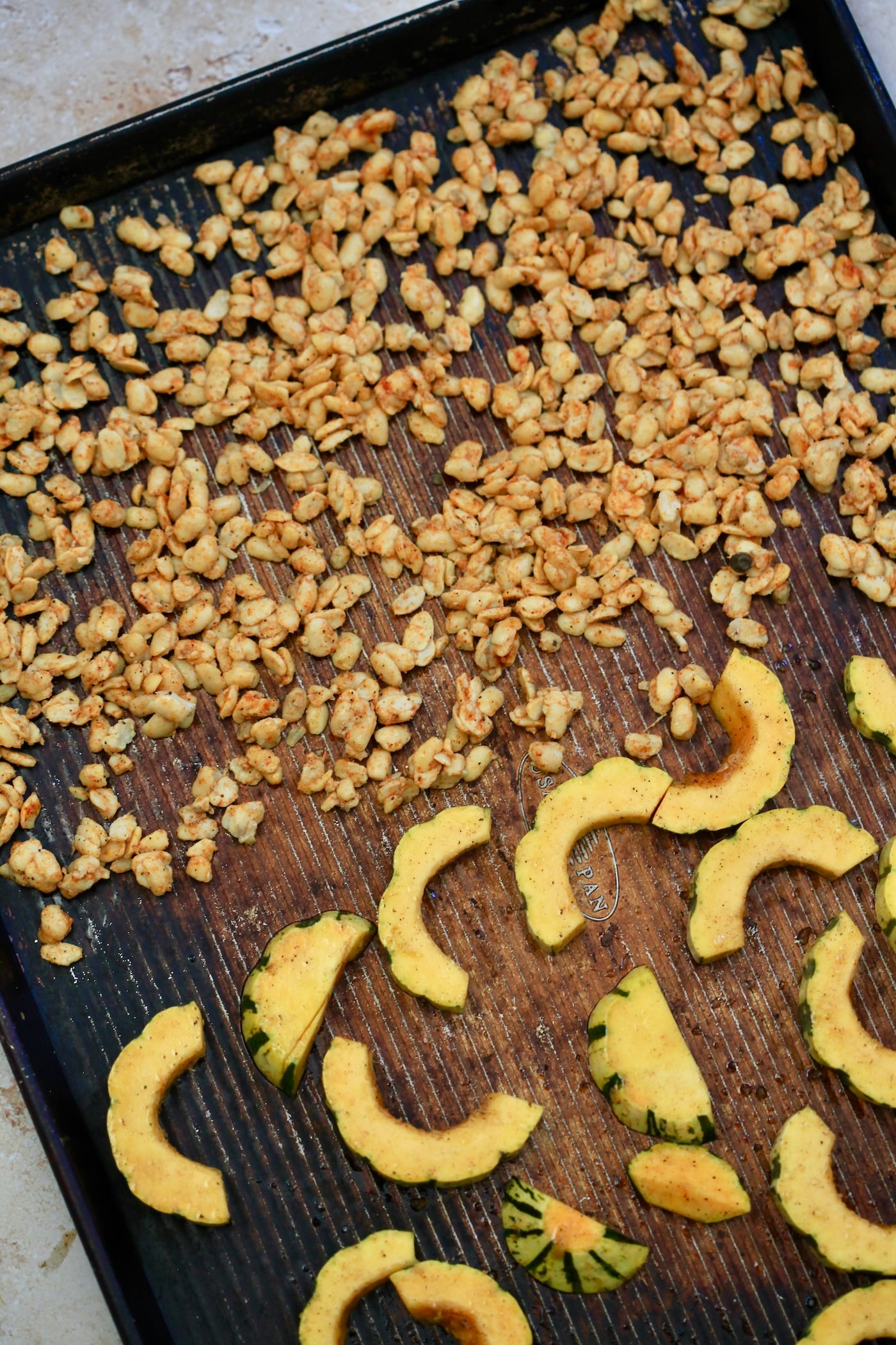 tempeh and squash on baking sheet uncooked