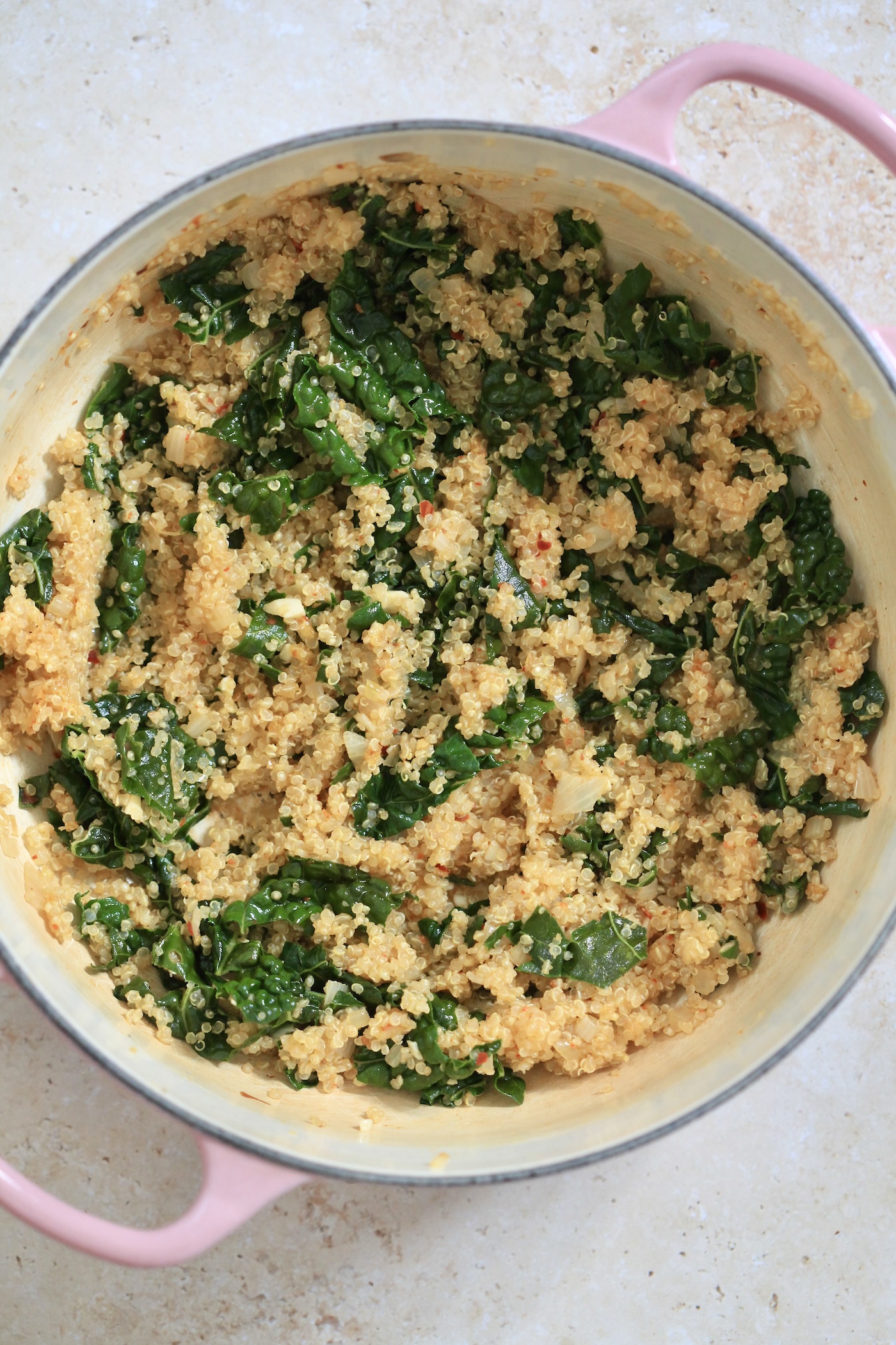 quinoa and kale in pot.