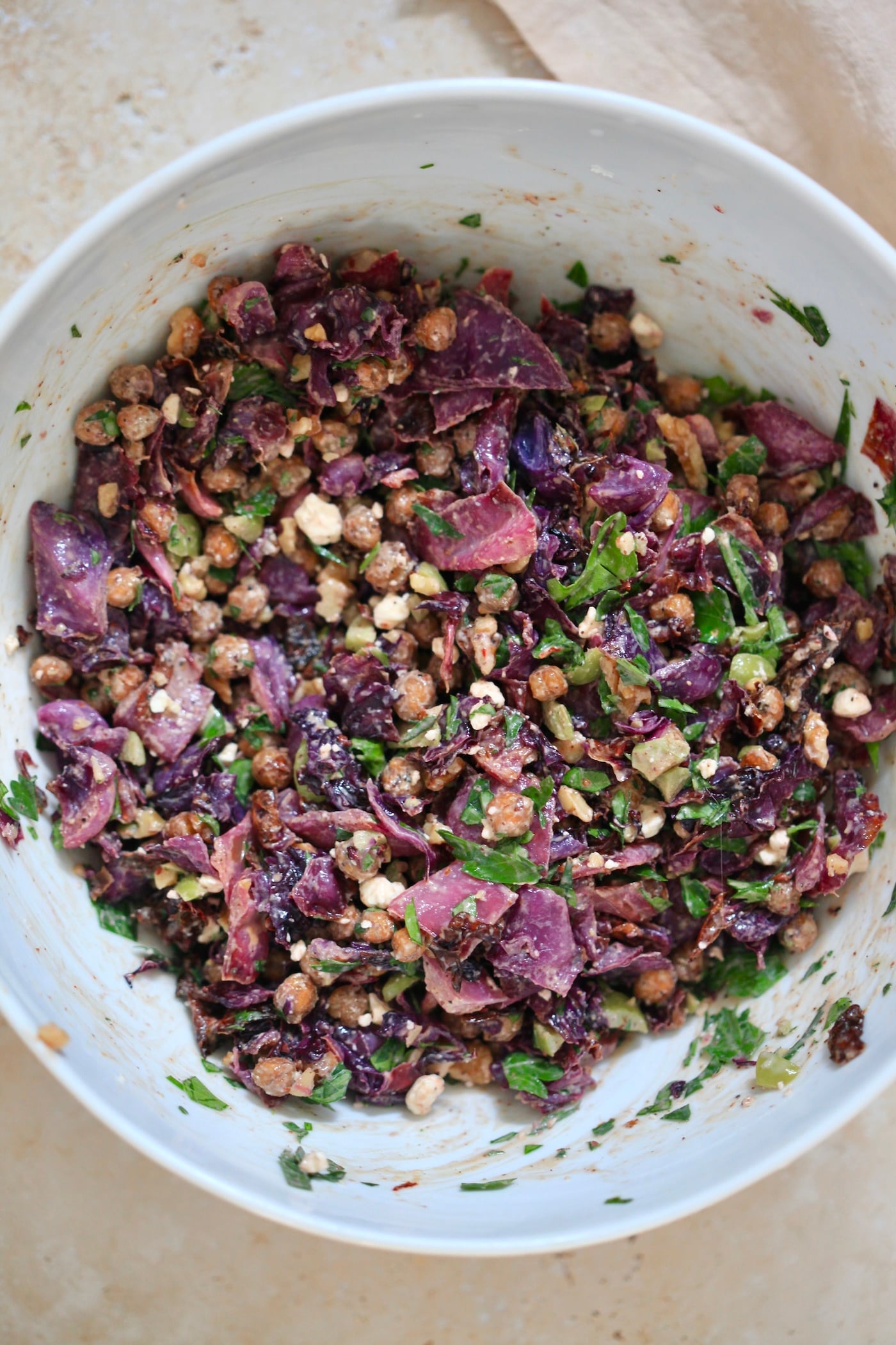 mixed red salad in mixing bowl.
