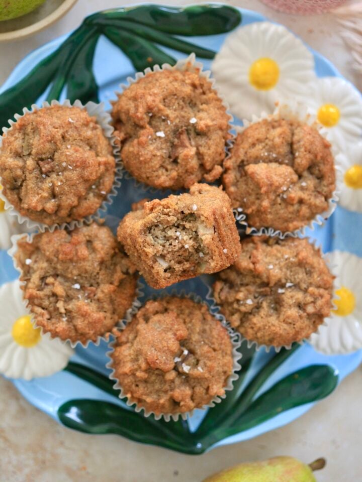 blue flower plate 7 muffins on it