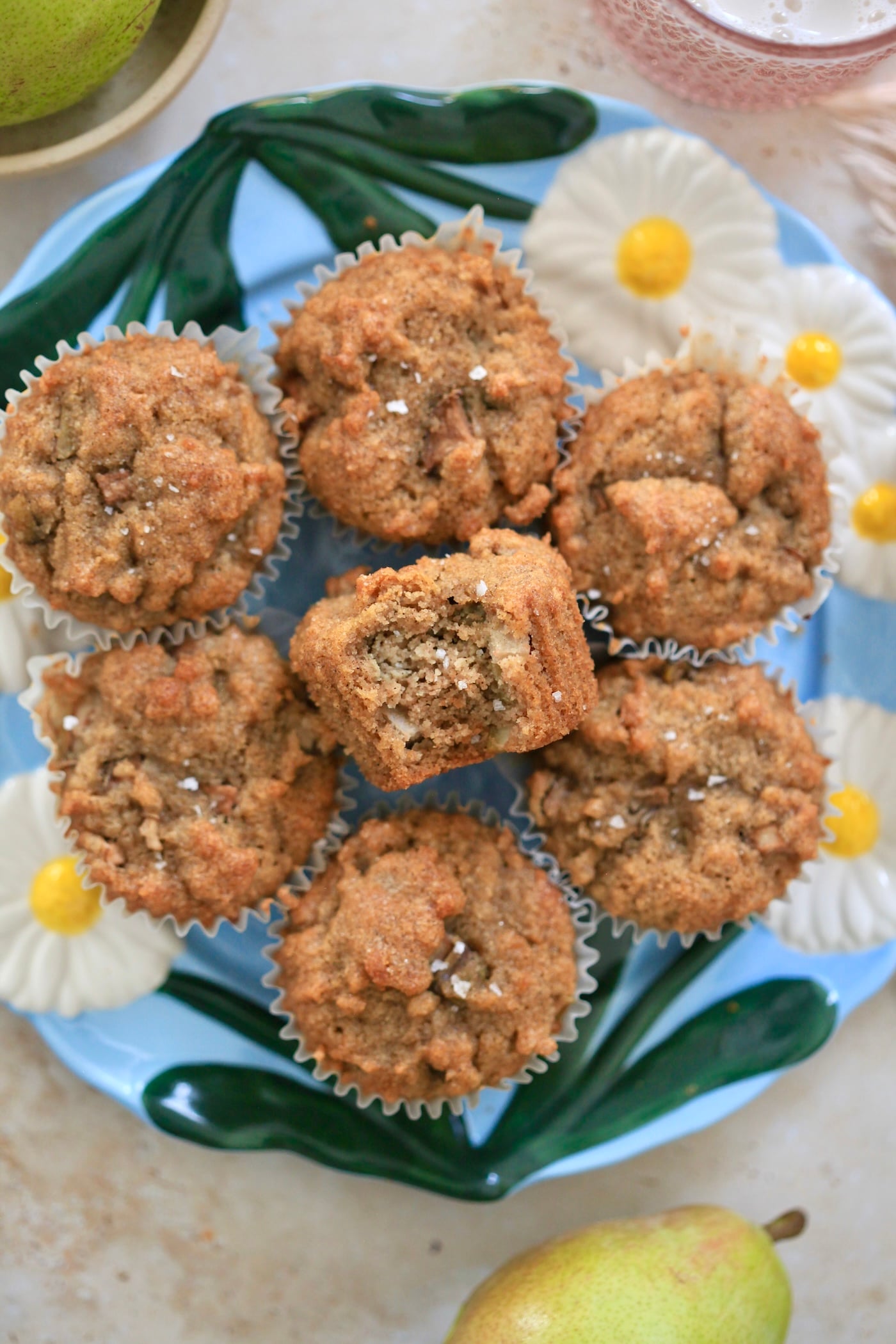 blue flower plate 7 muffins on it