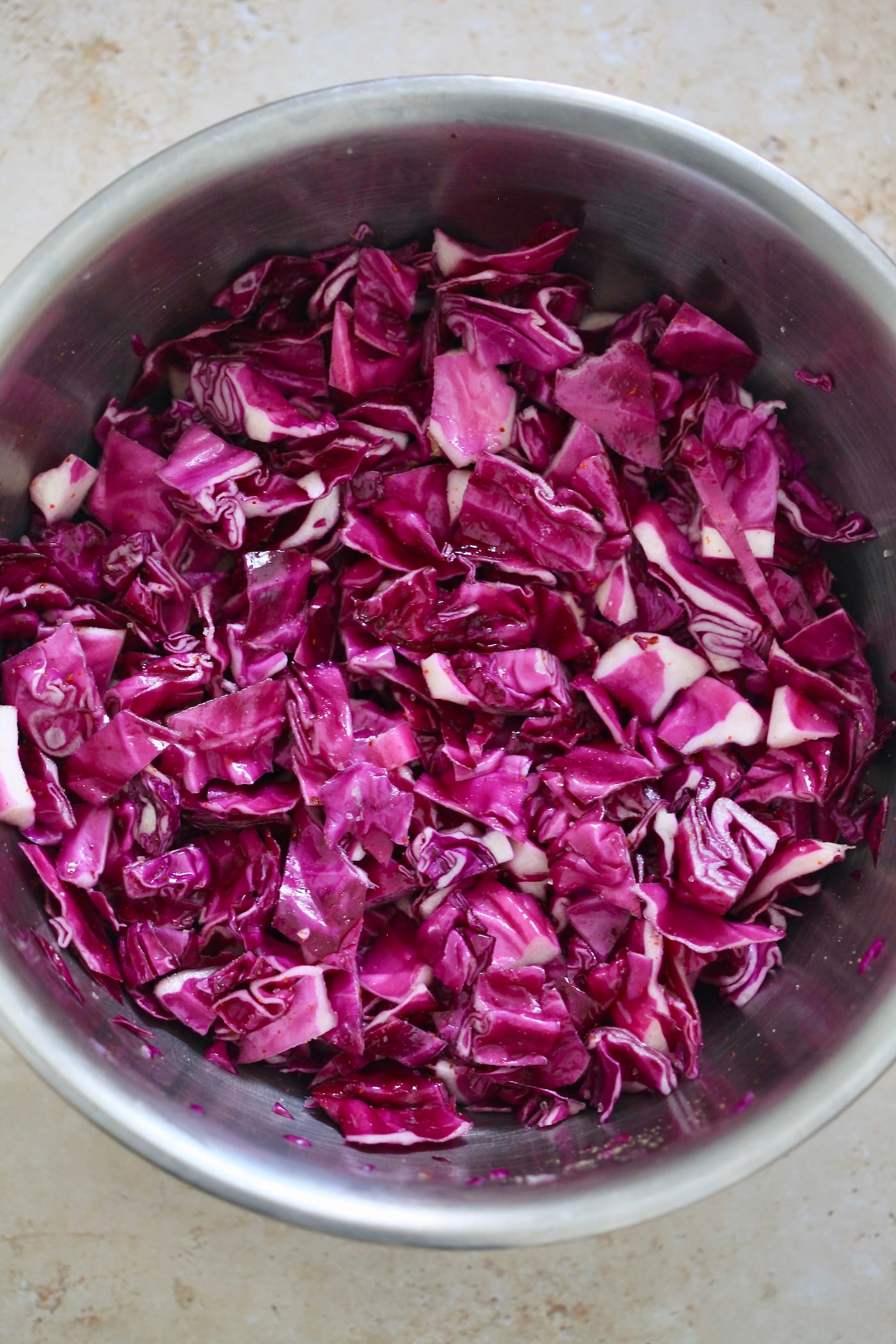 purple cabbage in mixing bowl.