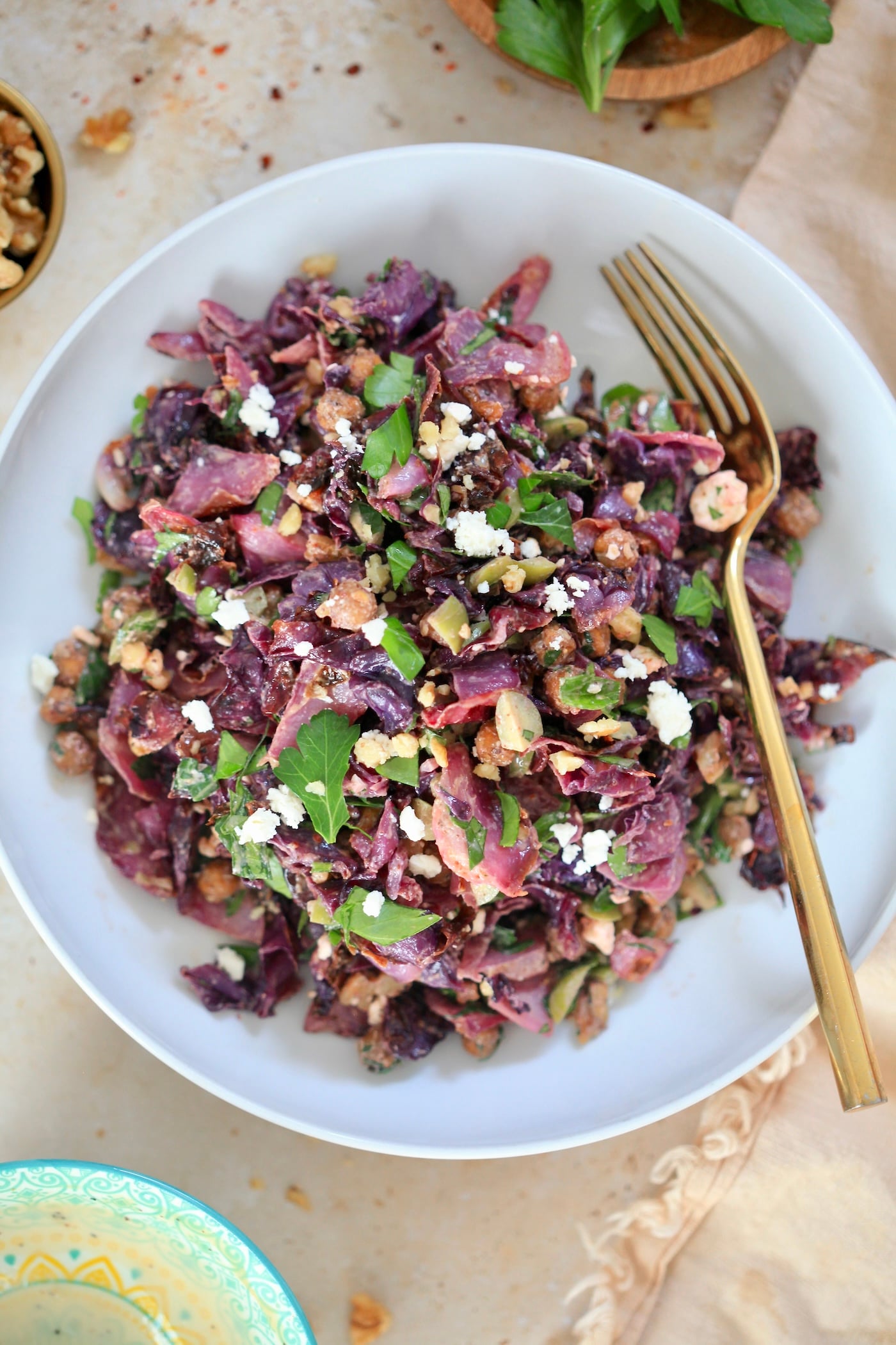 white bowl with purple cabbage salad.
