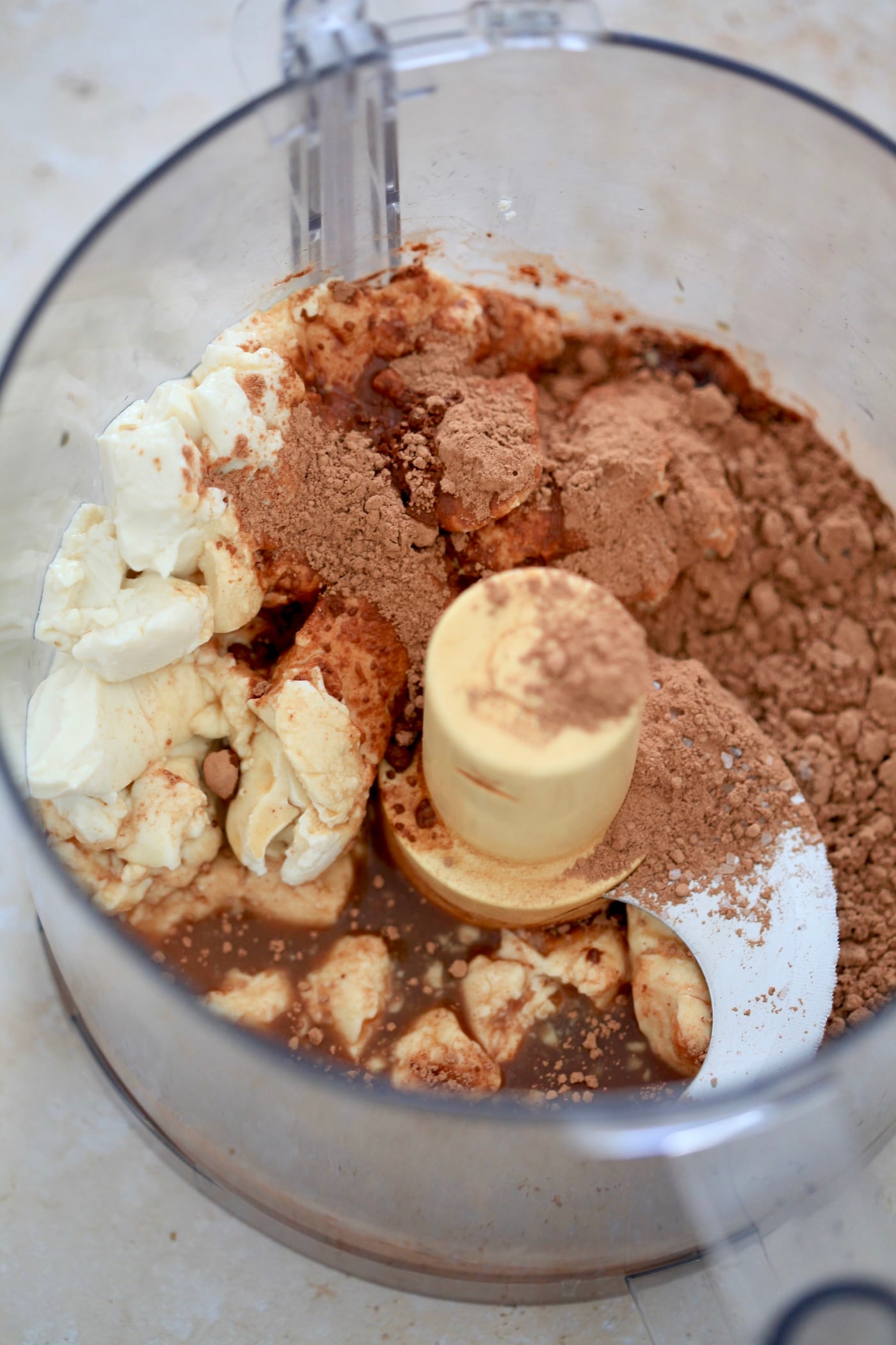 tofu in food processor with cocoa powder