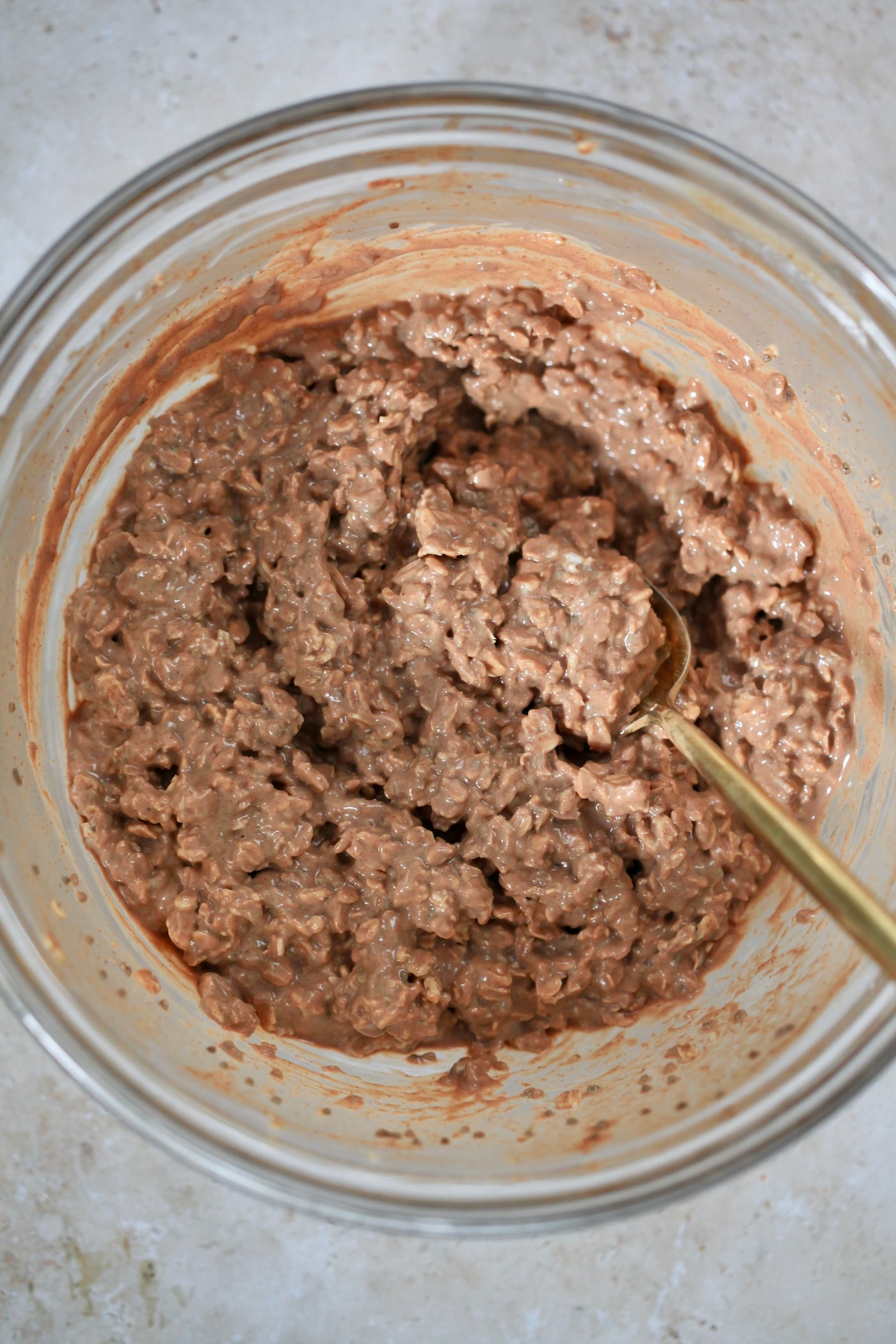 thickened brown oats in mixing bowl.
