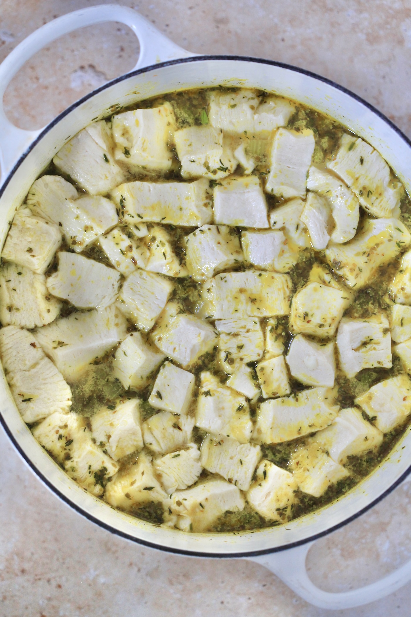 raw chopped biscuit dough covering soup.