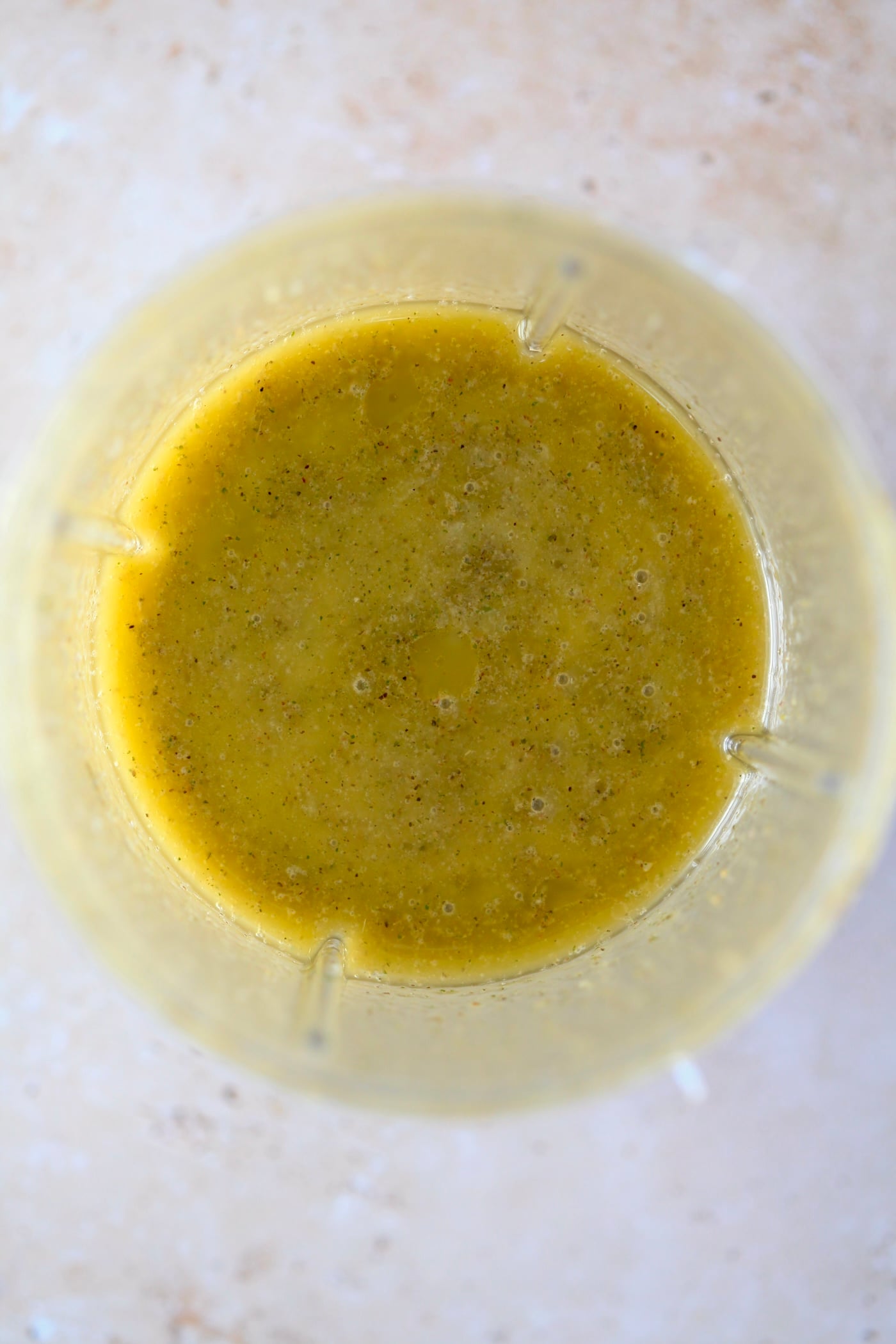 blended yellow dressing in cup