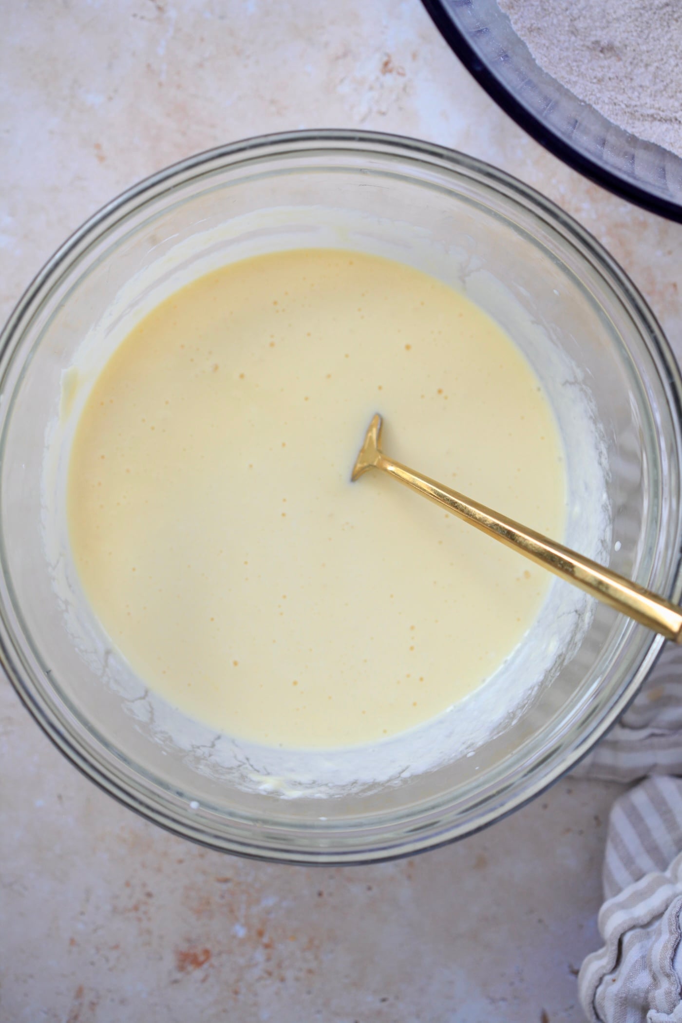 yellow liquid in mixing bowl.