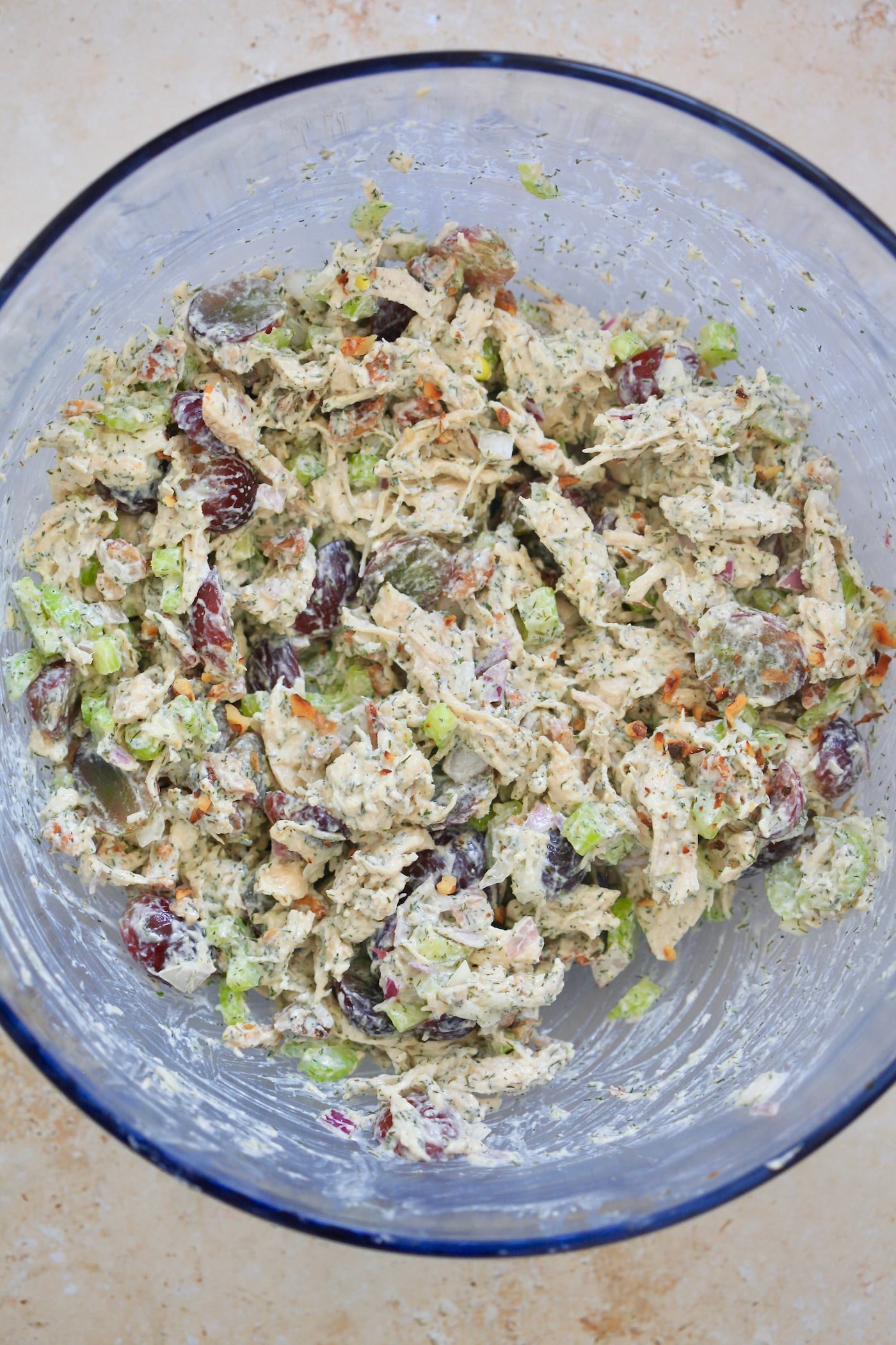 mixed colorful chicken salad in bowl.