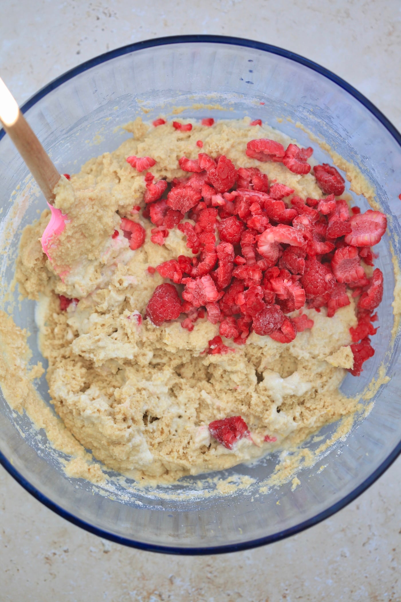 thick batter with raspberries on top.