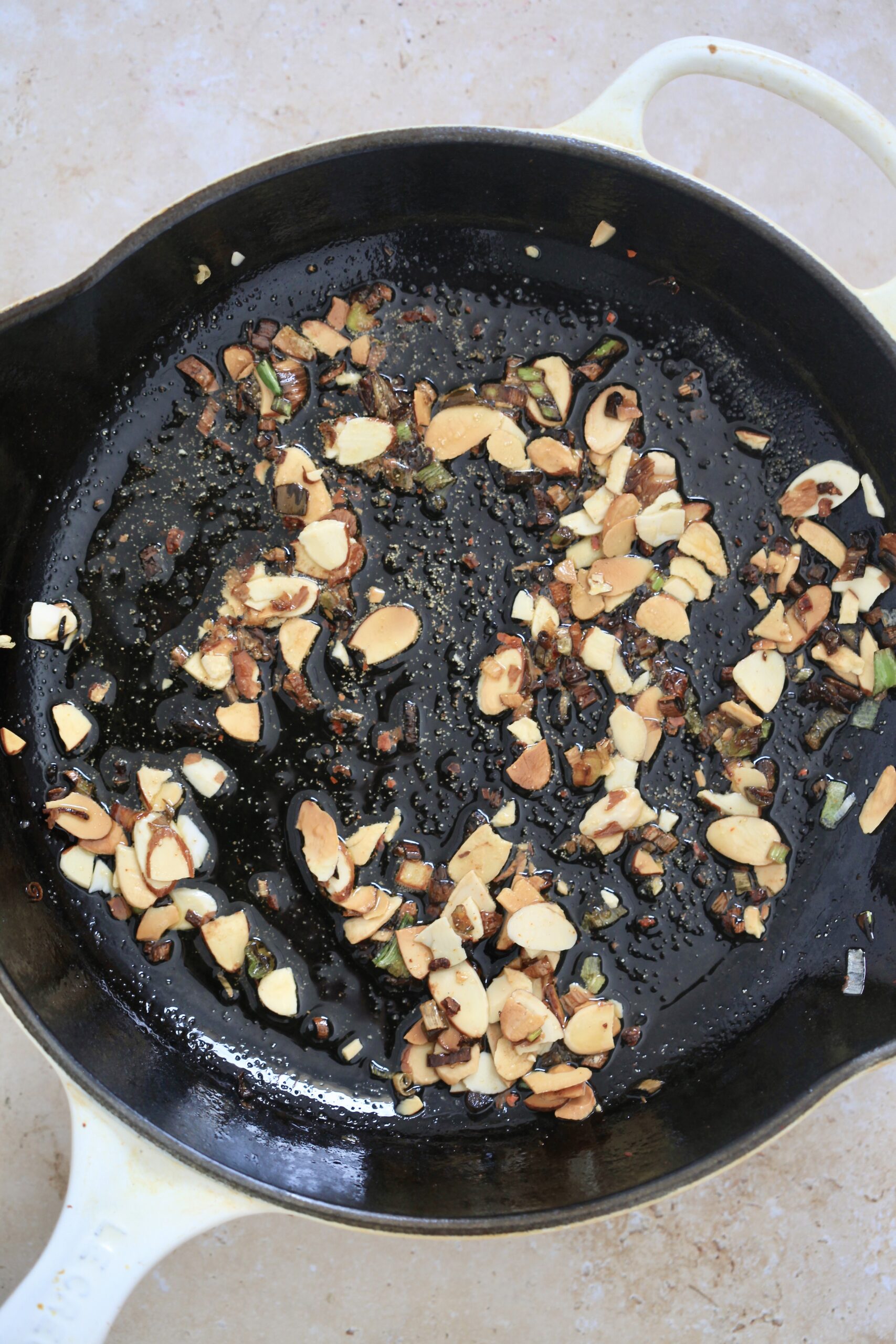 cast iron with almonds cooking