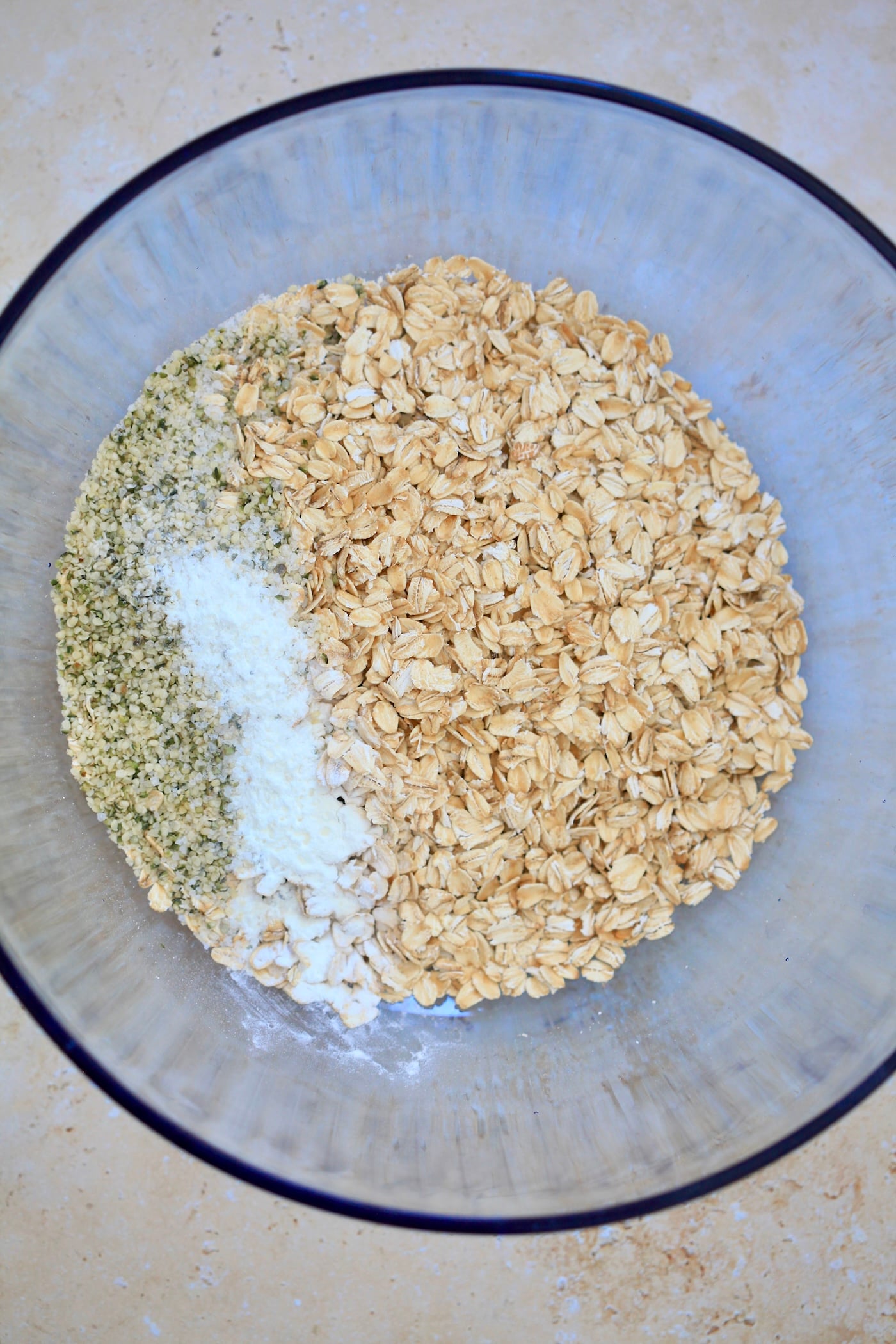 oatmeal and hemp seeds in mixing bowl.