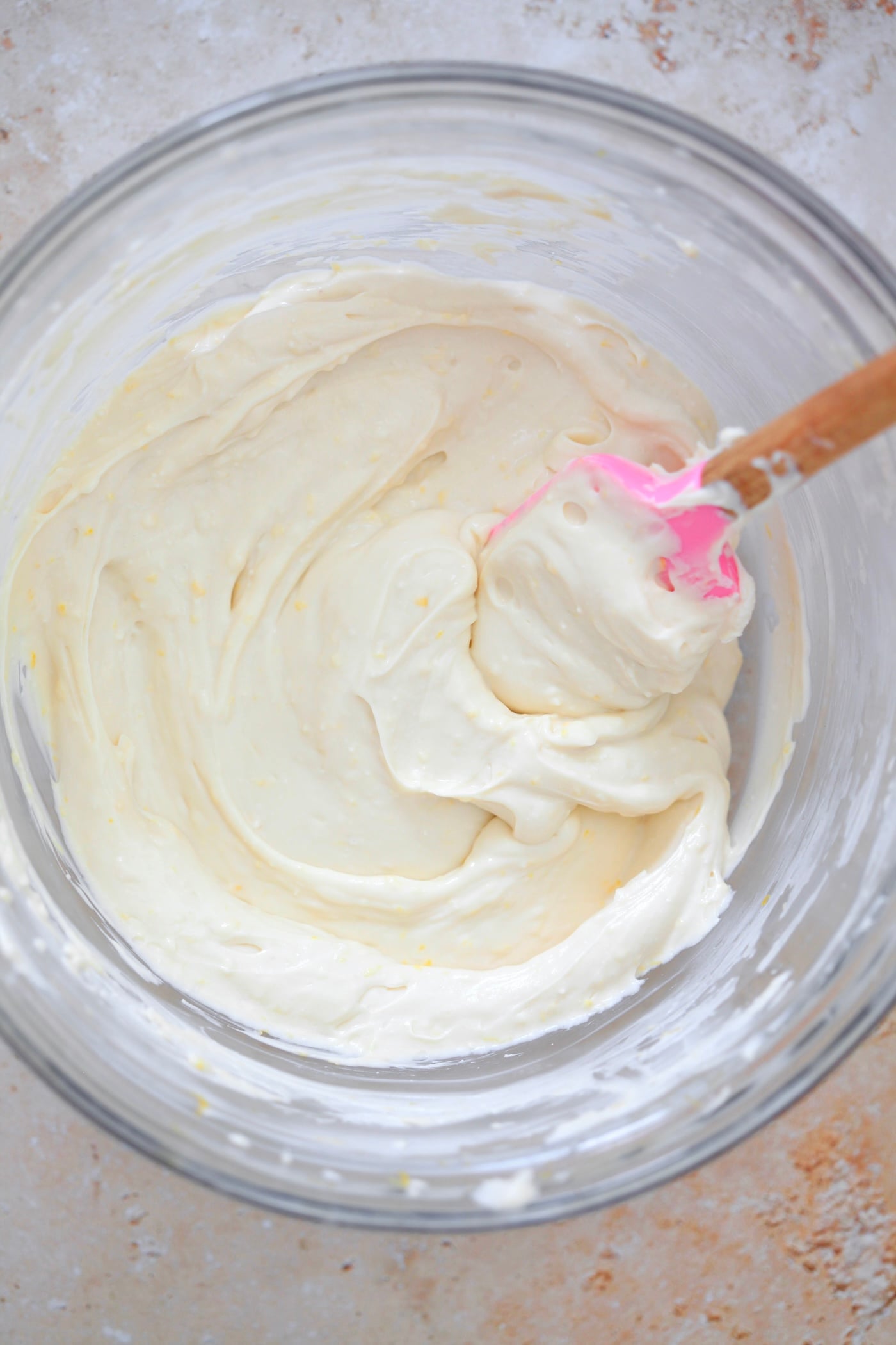 smooth white frosting in bowl.