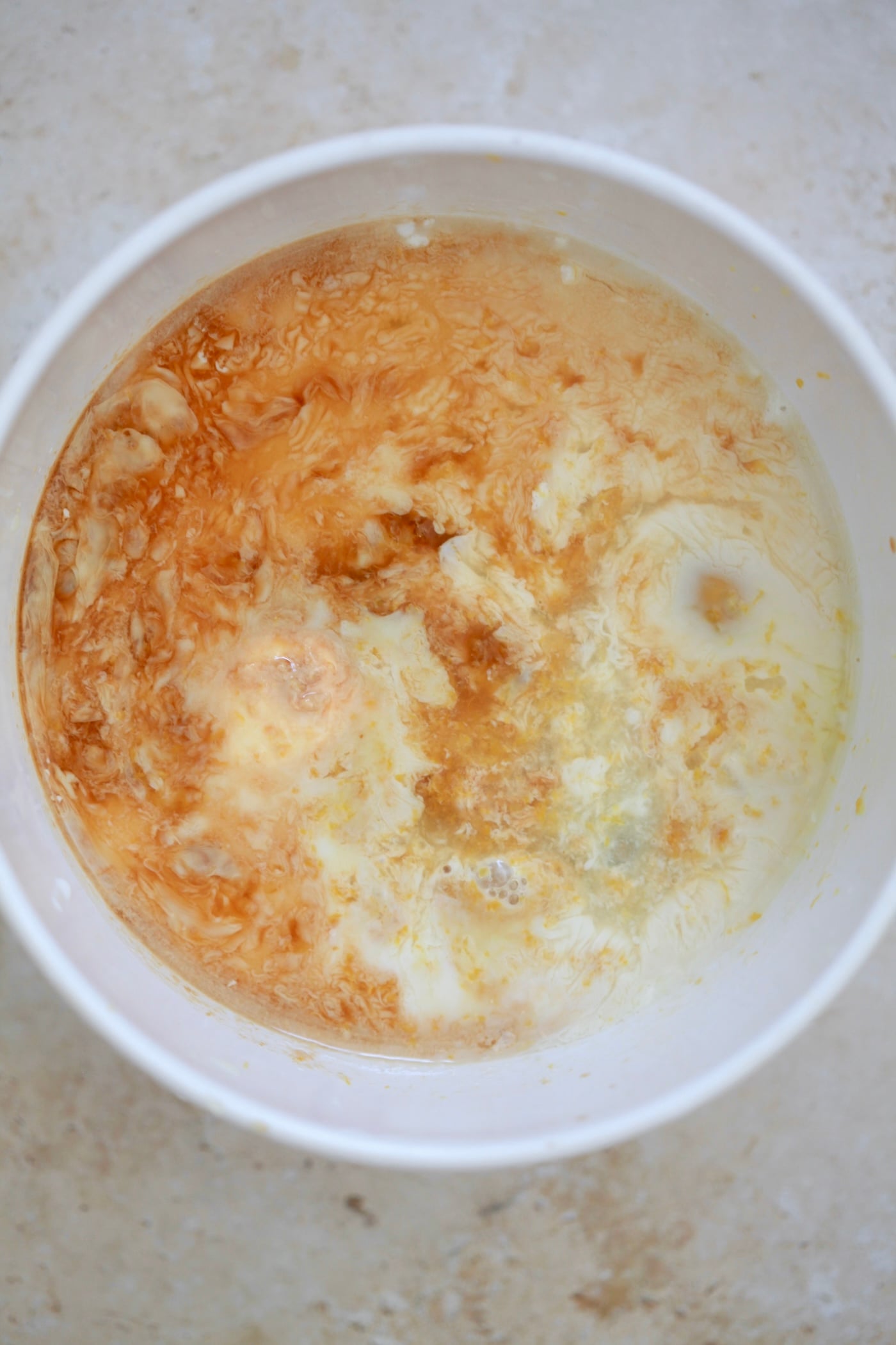white bowl with vanilla and milk.