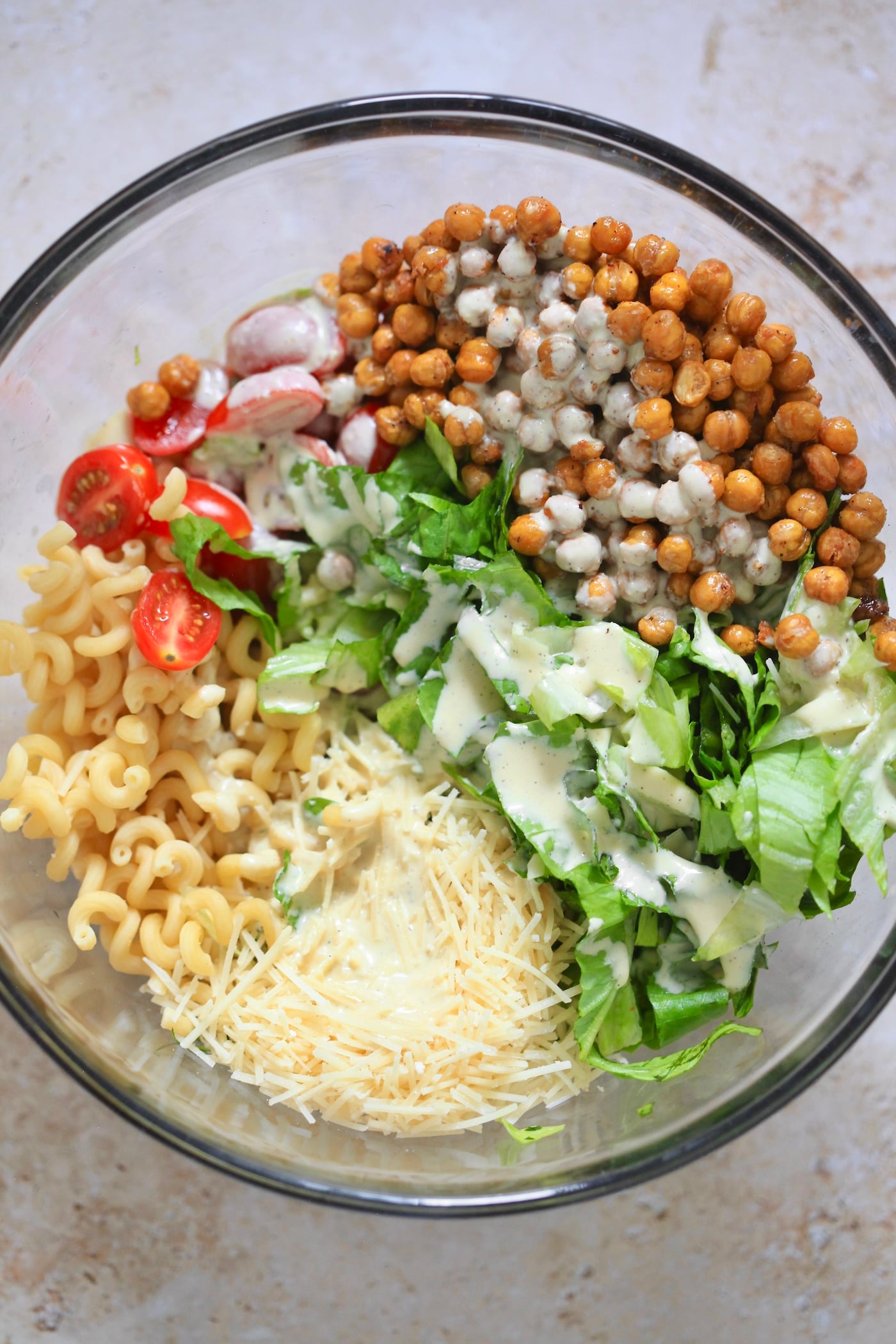 bowl with pasta, chickpeas, and tomatoes