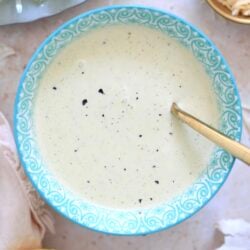 blue bowl with creamy pale dressing.