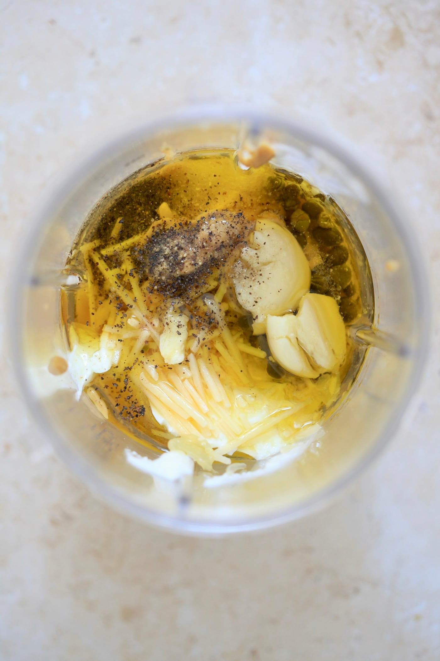 yogurt, oil, cheese and pepper in blender jar