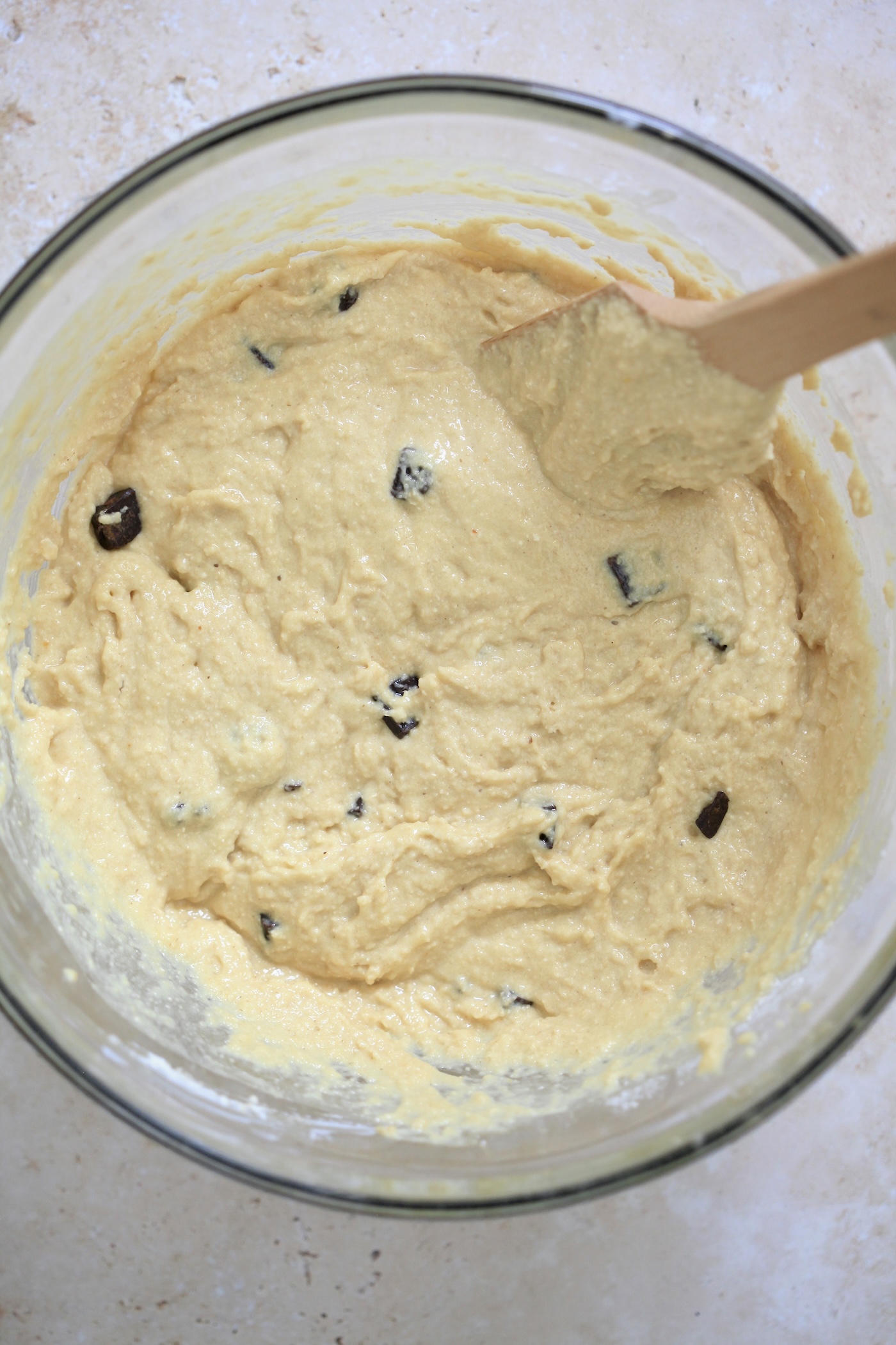 thick batter with wooden spoon.