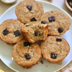muffins on plate with bite taken out