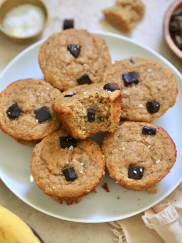 muffins on plate with bite taken out