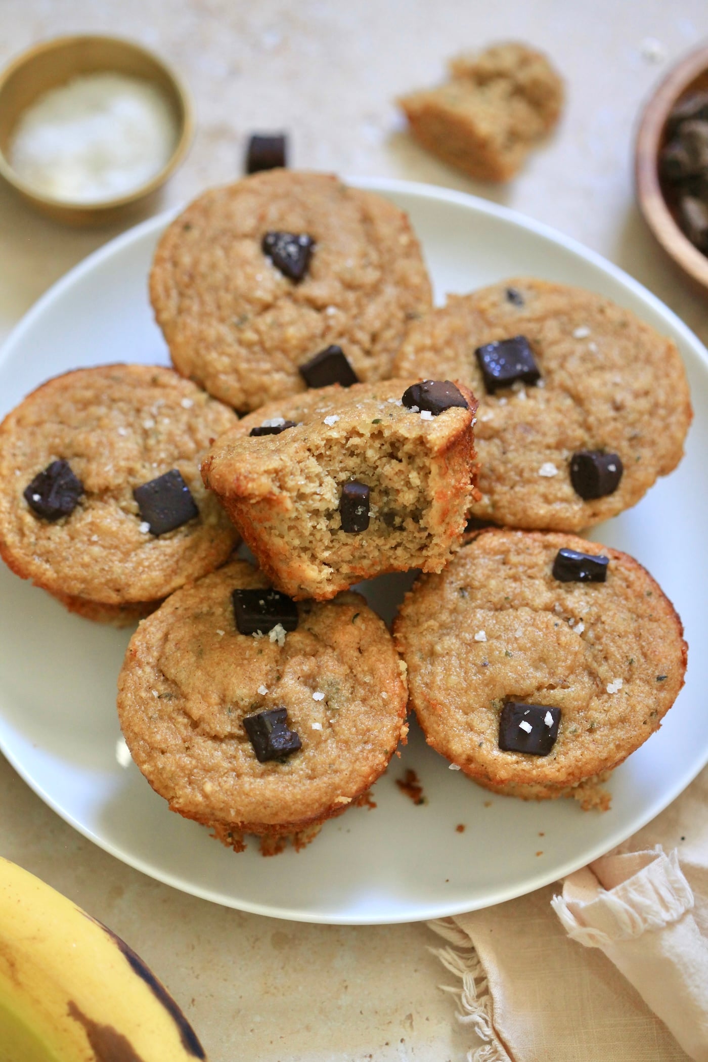 muffins on plate with bite taken out